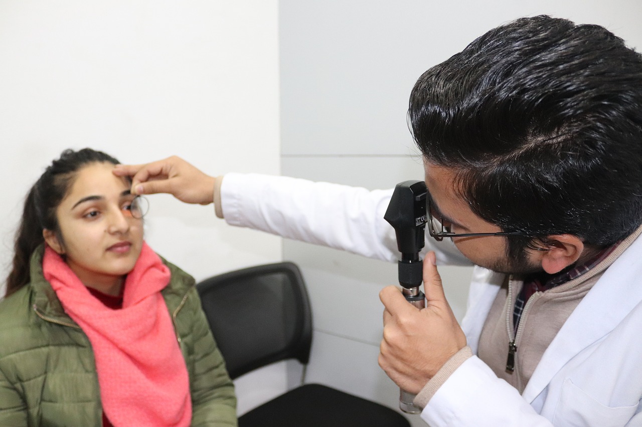 optometrist examining a patient
