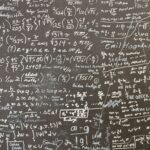 blackboard covered with equations